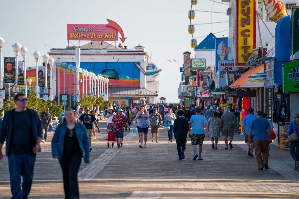 People walking along Ocean City, Maryland boardwalk